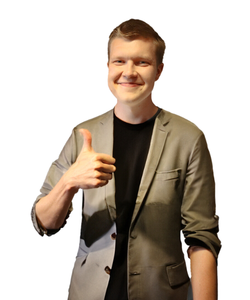 Young man smiling, thumb up. Wearing smart casual business outfit.